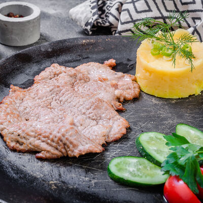 Отбивная из свинины в Сахара по цене 1120 ₽