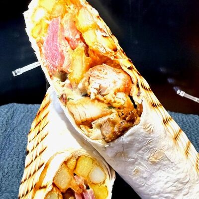 Шаурма сытная на сырном лавашев Grill shau по цене 429 ₽