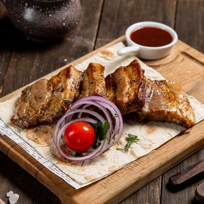 Свиные ребра в Шашлык Хаус GRILL&PIZZA по цене 770 ₽
