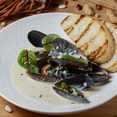 Мидии в сливочном соусе в Больше чем мясо по цене 855 ₽