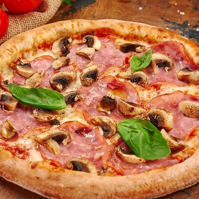 Пицца ветчина-грибы (23 см) в Пицца, паста и баста по цене 379 ₽