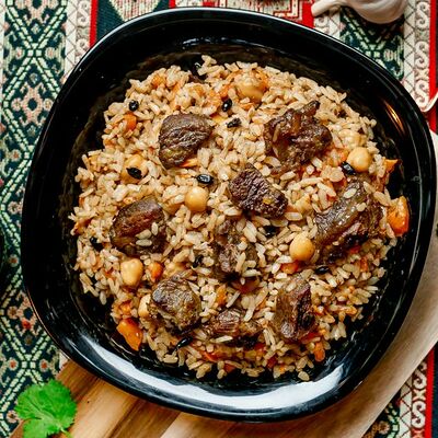 Плов узбекский с телятиной в Бурум по цене 450 ₽