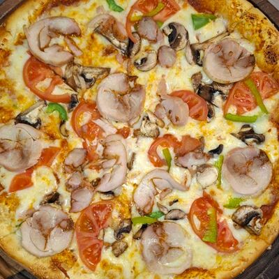 Пицца с курицей и грибами в Shafran по цене 160000 сум