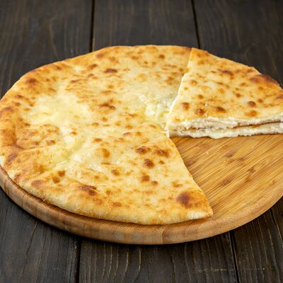 Осетинский пирог с сыром Уалибах в Осетинские пироги Вкусно Пироги по цене 1050