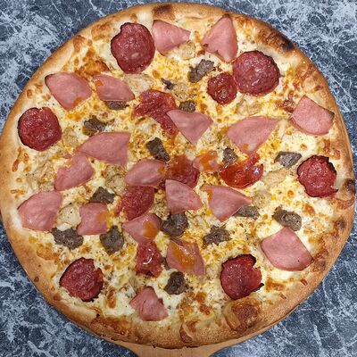 Пицца Мясное ассорти 35 см в Кафе-столовая 24 по цене 810 ₽