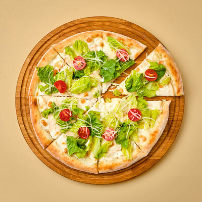 Пицца Цезарь в Атлас еды по цене 750 ₽