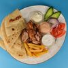 Гирос в тарелке со свининой в BingGyros по цене 395