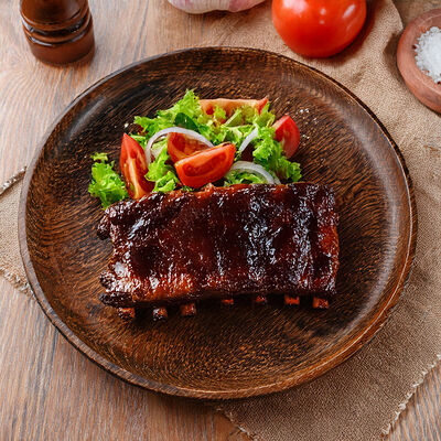 Ребра свиные под соусом барбекю в Берлога по цене 650 ₽