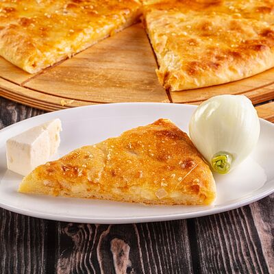 Осетинский пирог с сыром и репчатым луком в Осетинские Пироги по цене 1150 ₽