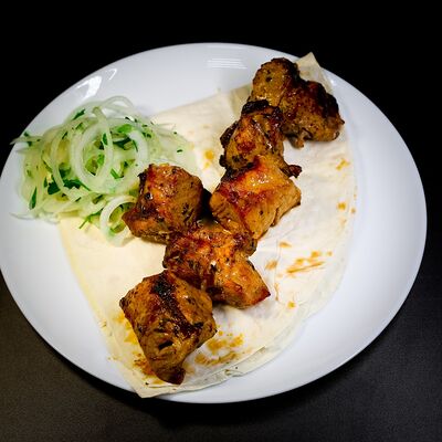 Шашлык из cвинoй шеи в Mangal №1 по цене 660 ₽