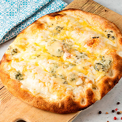 Пиццетта Кватро Формаджи в iL Патио по цене 699 ₽