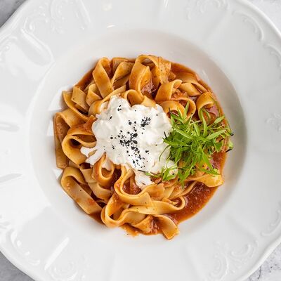 Фетучини со страчателлой в томатном соусе в Патис по цене 667 ₽