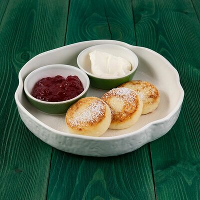 Сырники с топпингом в Solar Bistro по цене 350 ₽