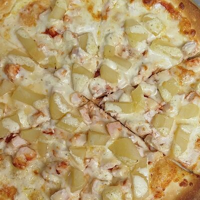 Пицца Курица и ананасы M в SUSHIROLLS по цене 590 ₽