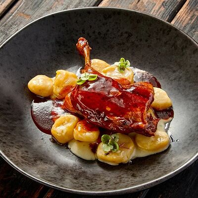 Утиная ножка с клецками из тыквы в Про печь по цене 665 ₽