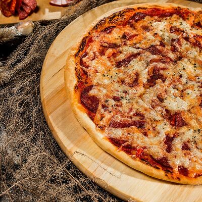 Пепперони в Пицца стучится по цене 550 ₽