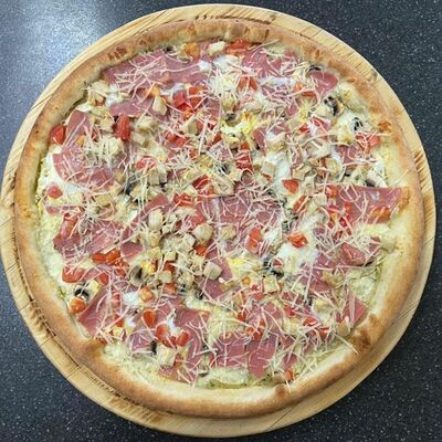 Пицца домашняя в Pizza-grand по цене 780 ₽