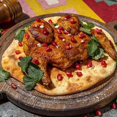 Цыплёнок табака в Хачапури по цене 950 ₽