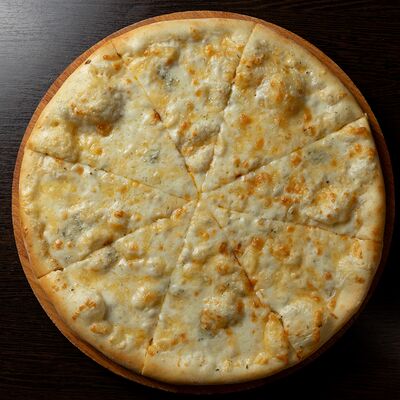 Пицца Четыре сыра в Tenkei по цене 560 ₽