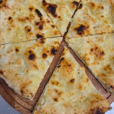 Фоккача с пармезаном в Опера траттория по цене 435 ₽