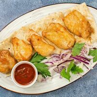 Куриное бедро в Бари Галуст кафе