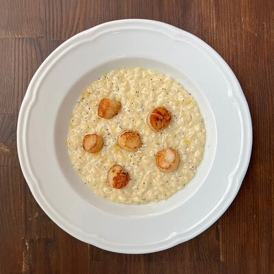 Ризотто с гребешками и макомв Прошуттерия по цене 1600 ₽