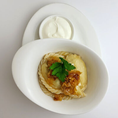 Вареники с картофелем и золотистым луком в Атмосфера по цене 455 ₽