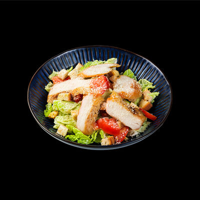 Салат Цезарь с курицей в Wokmania по цене 334 ₽