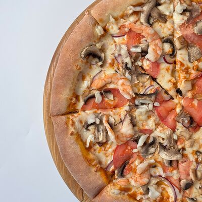 Пицца Том - Ям с морепродуктами 25см в Панда Бистро по цене 755 ₽