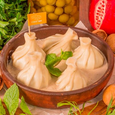 Хинкали с сыром, мятой и тархуном в ореховом соусе в Мушмула по цене 399