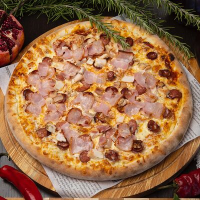 Пицца мясное ассорти в Эларджи по цене 1450 ₽