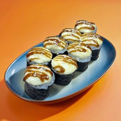 Запеченный ролл с крабом в Мак и манго по цене 390 ₽