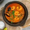 Острый суп с морепродуктами в стиле том ям в Hygge Kafe по цене 650