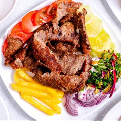 Порцион в тарелке в Istanbul shef doner 24 по цене 750 ₽