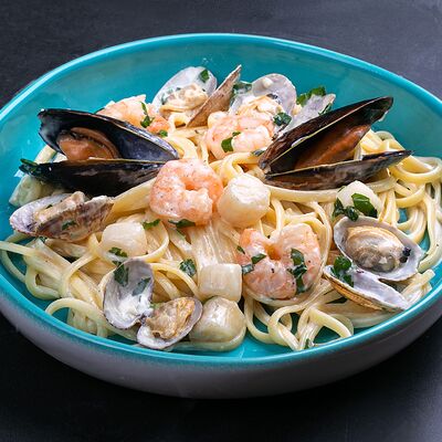 Паста с гребешками и морепродуктами в Лакс+ по цене 1100 ₽