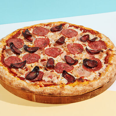 Мясная De Lux пицца 25 см в Ostrov по цене 705 ₽