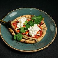Баклажан запеченный с соусом сацебели и хумусом из белой фасоли в Megobari