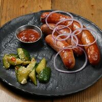 Ассорти колбас с аджикой и битыми огурцами в Brasserie Kriek
