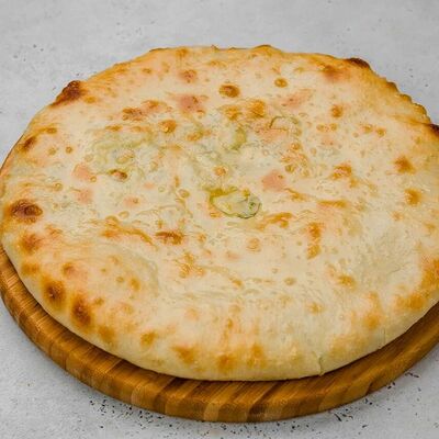 Пирог с сыром и зеленым луком в Осетинские пироги Вкусно Пироги по цене 620
