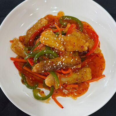 Рыба в кисло-сладком соусе в Чойхона Хаким Ака по цене 470 ₽