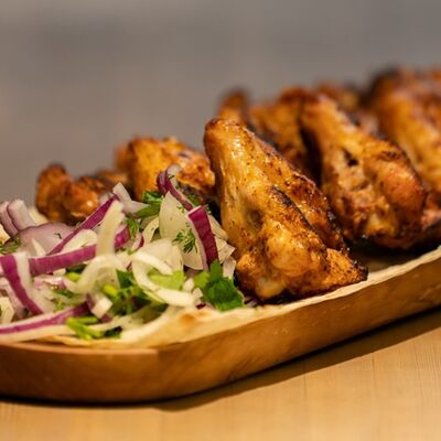 Куриная голень на мангале в Наш Лаваш по цене 430 ₽