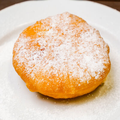 Пончик с кремом в Эра Вкуса по цене 65 ₽