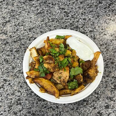 Картофель жареный с курицейв Каракилис по цене 399 ₽