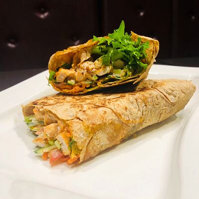 Шаурма острая с курицей в Wasabl по цене 310 ₽