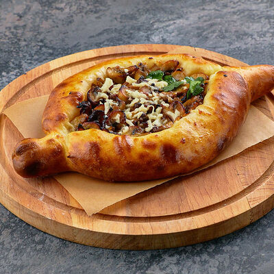 Хачапури по-аджарски с грибами и сыром в Ели-Пили по цене 530 ₽