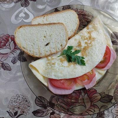 Омлет с ветчиной и сыром в Осетринка по цене 300 ₽