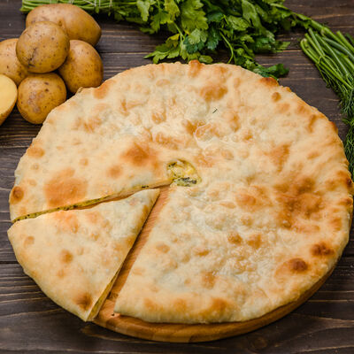 Пирог с картошкой и зеленью в Осетинские пироги Вкусно Пироги по цене 499