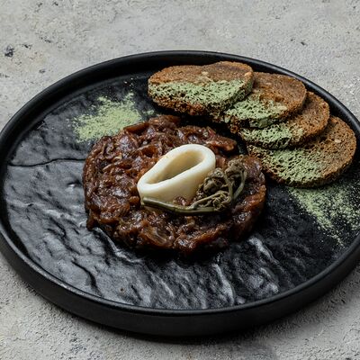 Тартар из фермерской телятины, папоротник, сливочный хрен в Кафе 38 по цене 800 ₽