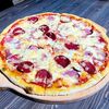 Пицца Мясная в Dukes по цене 750
