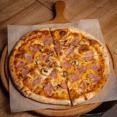 Пицца ветчина грибы 30 см в Polla Vina по цене 780 ₽